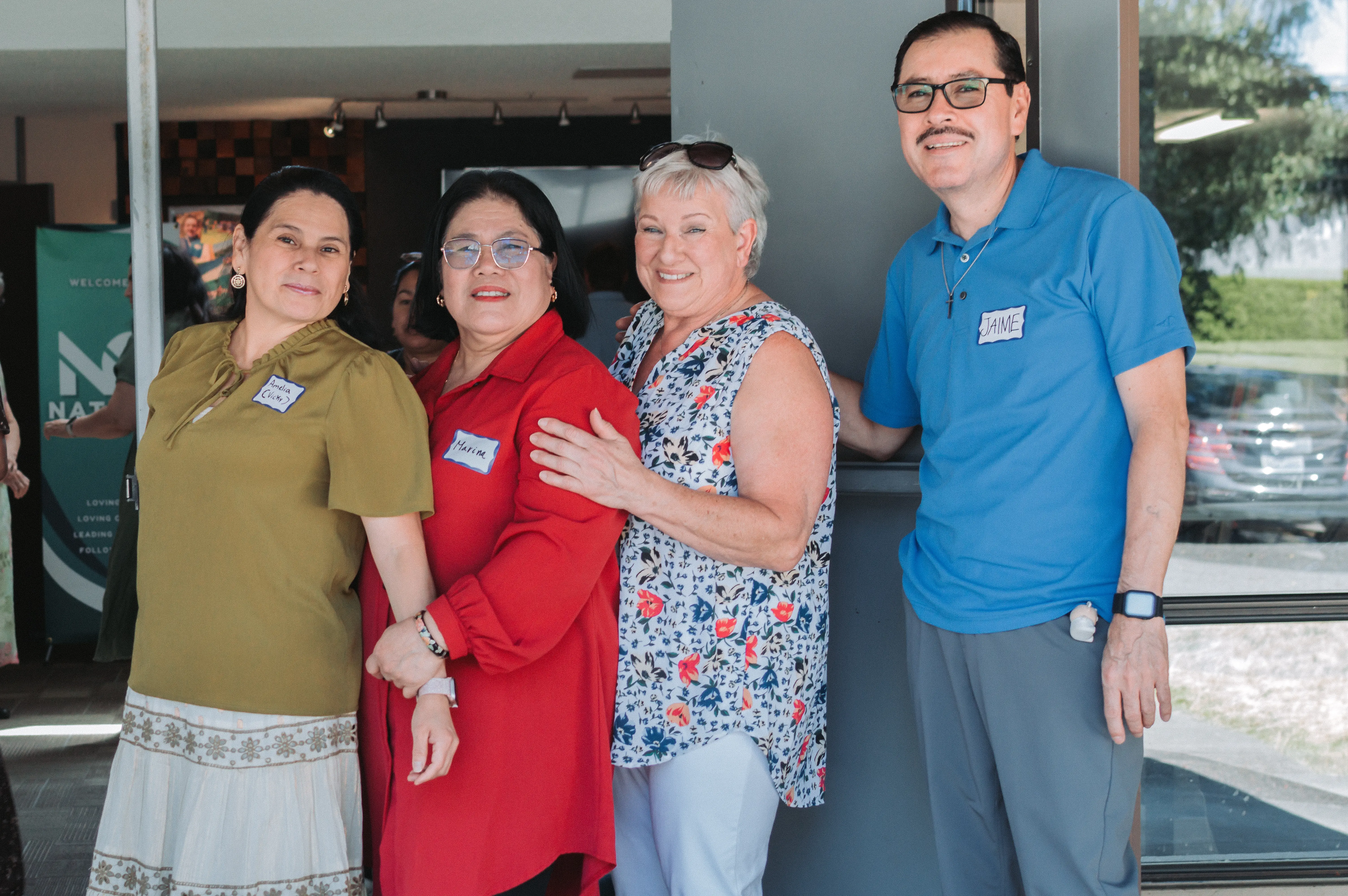 Volunteers serving food and helping at church event